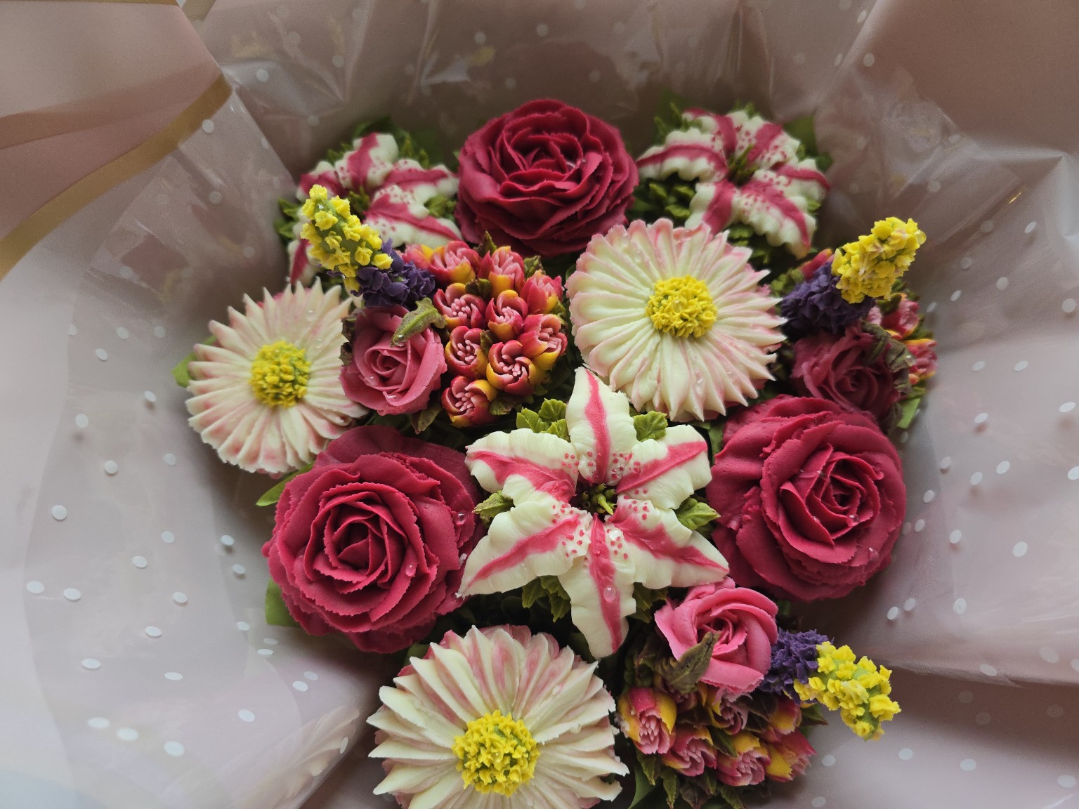 Vibrant handcrafted buttercream floral cupcake bouquet